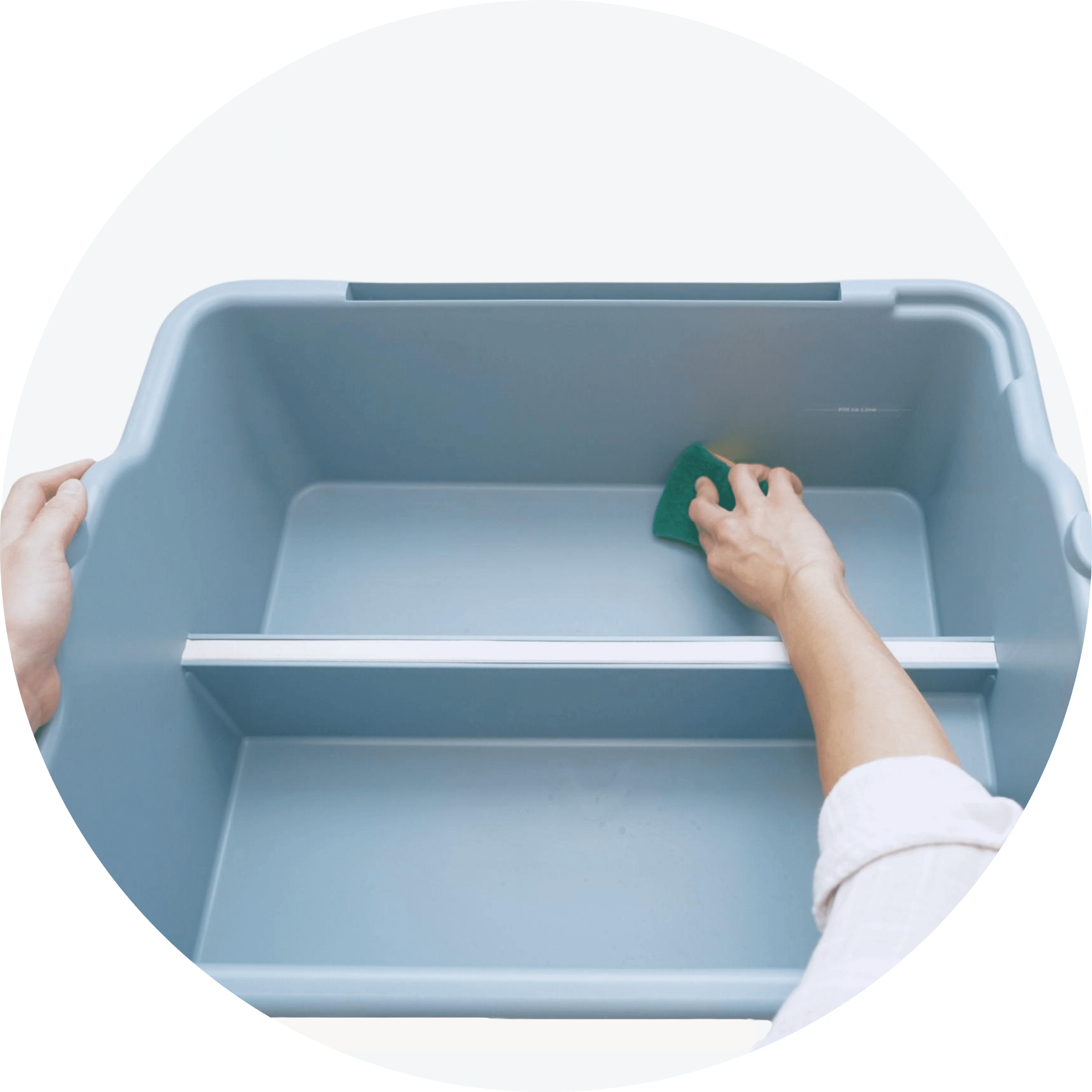 Person cleaning the Mighty Sink indoor and outdoor portable sink water storage with sponge